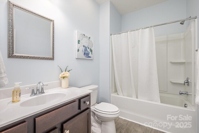 1512 Brooksland Pl, Waxhaw, NC 28173 - bathroom featuring toilet, shower / bath combination with curtain, wood finished floors, and vanity