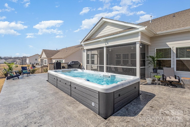 1512 Brooksland Pl, Waxhaw, NC 28173 - view of pool with a hot tub, a sunroom, a patio, a grill, and a residential view