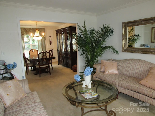 carpeted living room with an inviting chandelier and ornamental molding