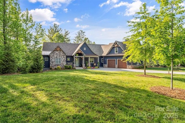 1289 Northview Dr, Morganton, NC 28655 - craftsman house with an attached garage, concrete driveway, a front yard, and stone siding