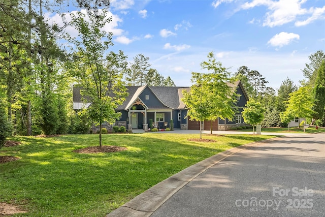 1289 Northview Dr, Morganton, NC 28655 - craftsman-style home featuring an attached garage, driveway, and a front yard