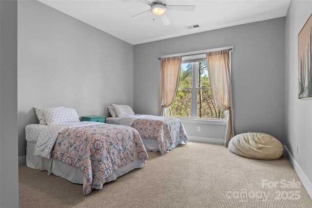 1289 Northview Dr, Morganton, NC 28655 - carpeted bedroom with a ceiling fan, baseboards, and visible vents