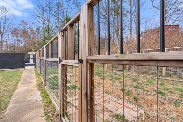 exterior space with a gate and fence