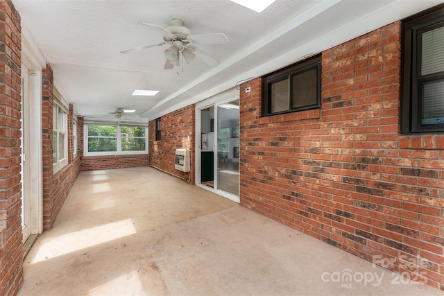 31 Vista Dr, Candler, NC 28715 - unfurnished sunroom with a ceiling fan and heating unit