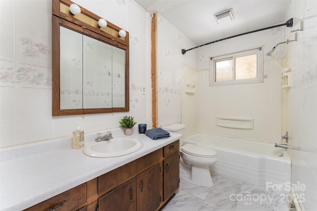 31 Vista Dr, Candler, NC 28715 - bathroom with vanity, shower / washtub combination, toilet, and marble finish flooring