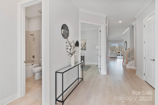 1132 Meander Ln, Waxhaw, NC 28173 - hallway featuring crown molding, light wood-style flooring, and recessed lighting