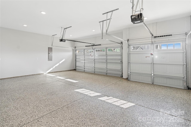 1132 Meander Ln, Waxhaw, NC 28173 - garage with a garage door opener, recessed lighting, and electric panel