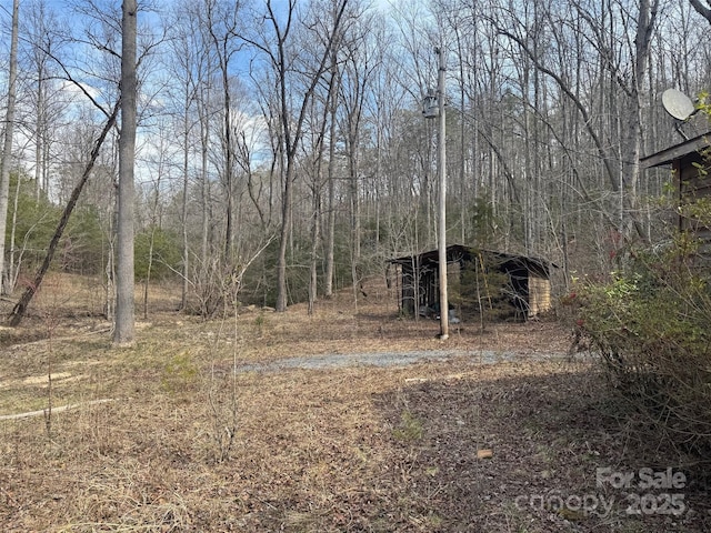 137 Cottage Pl, Lake Lure, NC 28746 - view of local wilderness featuring a wooded view