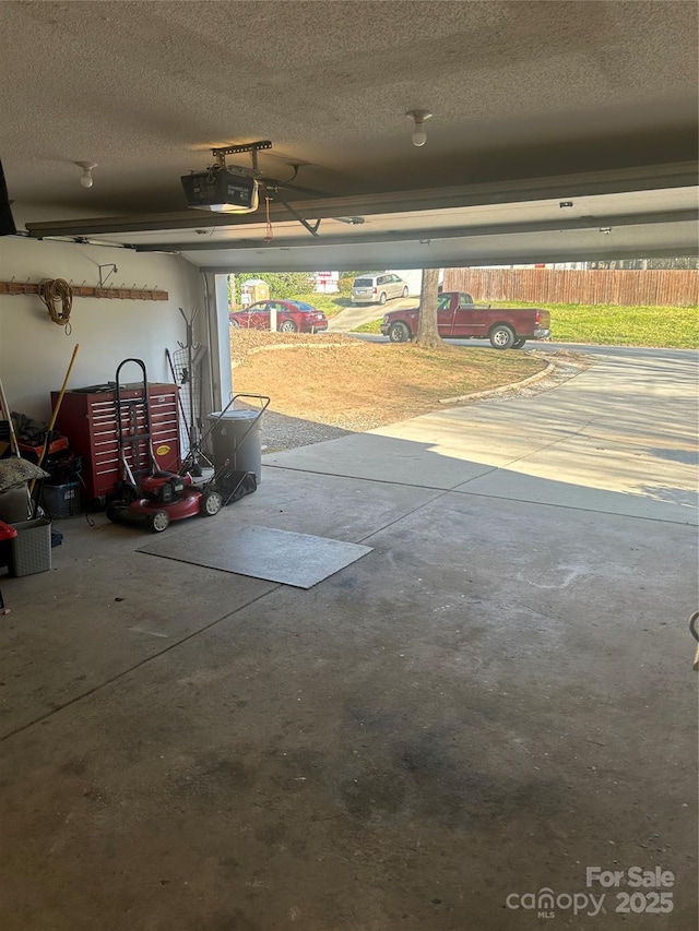 garage featuring a garage door opener