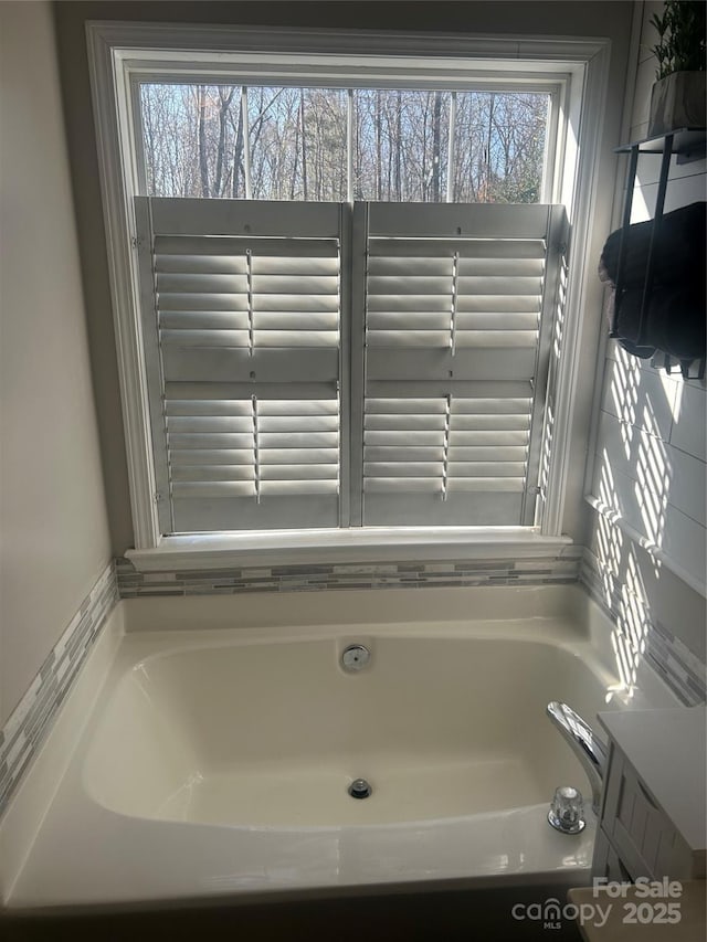 bathroom with a bath