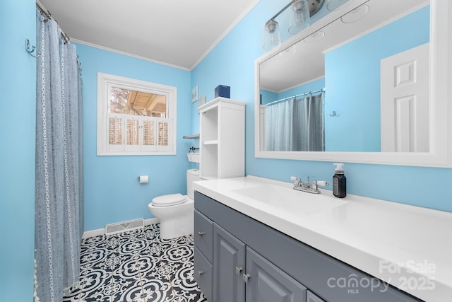 bathroom with tile patterned flooring, toilet, visible vents, and ornamental molding