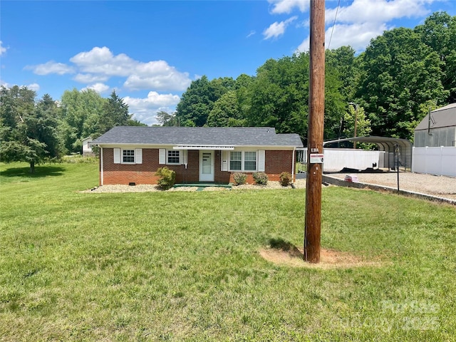 1802 Young Dr, Conover, NC 28613 - single story home featuring a carport, brick siding, a front yard, and crawl space