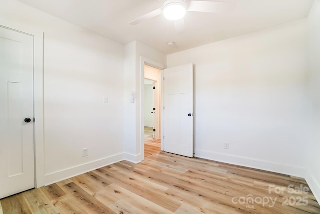 1116 Carolina Ave, Rock Hill, SC 29730 - unfurnished bedroom with a ceiling fan, light wood-style flooring, and baseboards