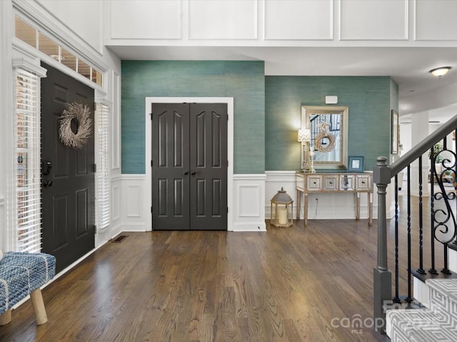 604 Wisteria Walk Way, Fort Mill, SC 29715 - entryway featuring a decorative wall, stairs, dark wood finished floors, a wainscoted wall, and wallpapered walls