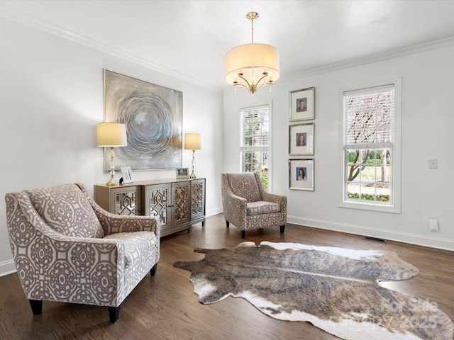 604 Wisteria Walk Way, Fort Mill, SC 29715 - living area featuring crown molding, wood finished floors, a chandelier, and baseboards