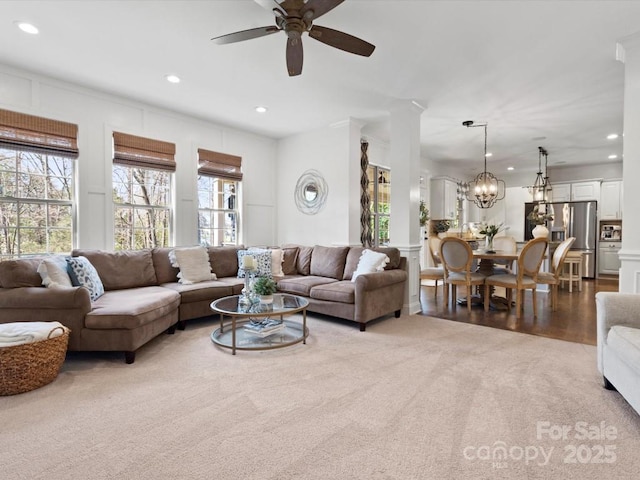 604 Wisteria Walk Way, Fort Mill, SC 29715 - living area with healthy amount of natural light, a ceiling fan, recessed lighting, carpet flooring, and a chandelier