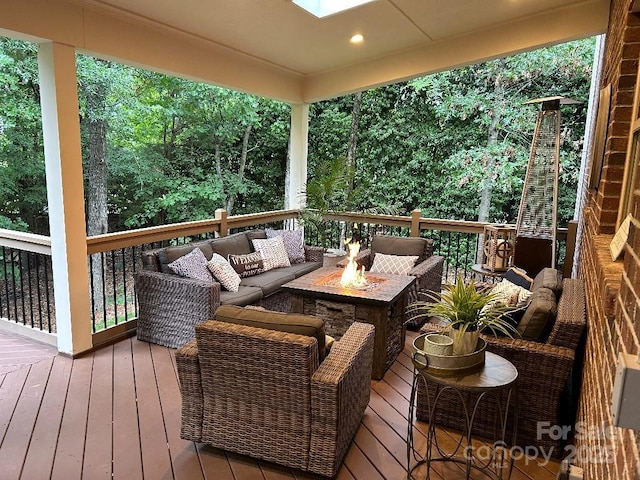 604 Wisteria Walk Way, Fort Mill, SC 29715 - deck with an outdoor living space with a fire pit