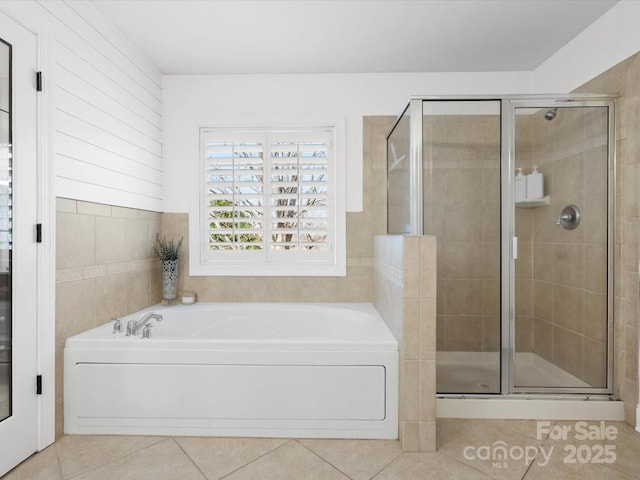 604 Wisteria Walk Way, Fort Mill, SC 29715 - bathroom featuring tile patterned flooring, a shower stall, and a bath