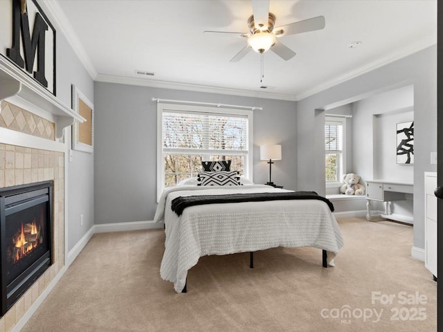 604 Wisteria Walk Way, Fort Mill, SC 29715 - bedroom with light colored carpet, a tile fireplace, crown molding, baseboards, and ceiling fan