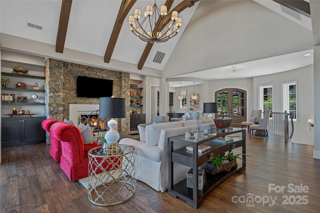 349 Stoneledge Trl, Arden, NC 28704 - living area with high vaulted ceiling, a notable chandelier, and visible vents