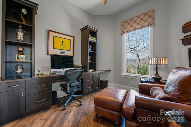 349 Stoneledge Trl, Arden, NC 28704 - home office featuring built in study area and dark wood finished floors