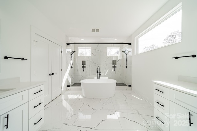 full bathroom featuring a marble finish shower, marble finish floor, visible vents, and vanity