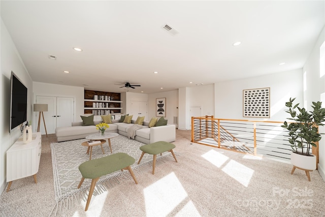 living room with visible vents, carpet, ceiling fan, and recessed lighting