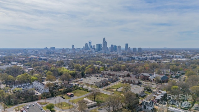 drone / aerial view featuring a city view