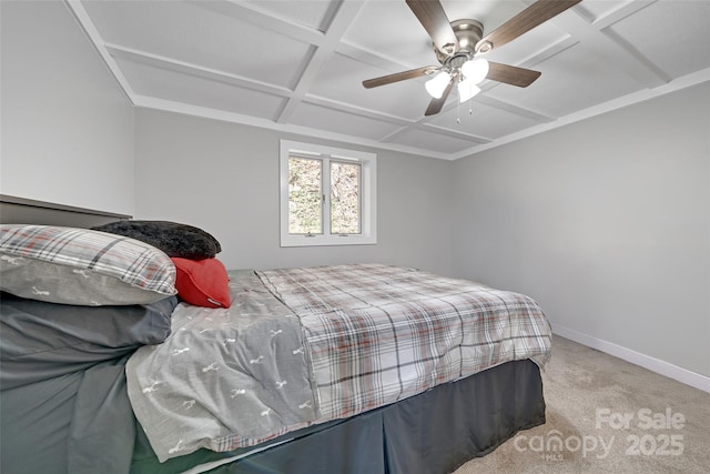 carpeted bedroom with beam ceiling, coffered ceiling, baseboards, and ceiling fan