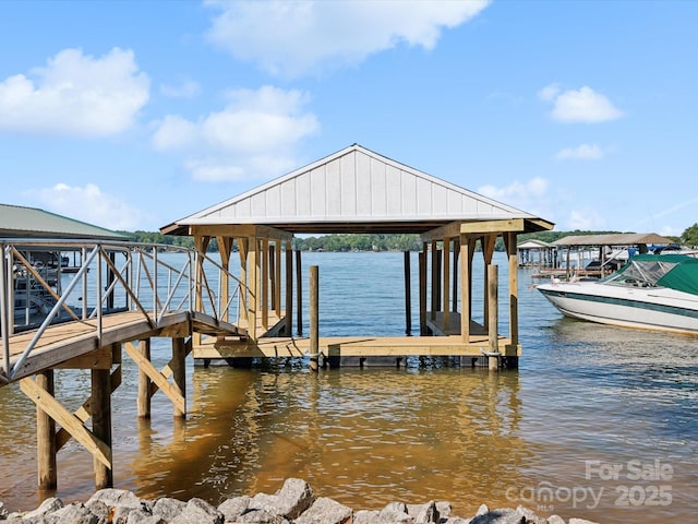 view of dock featuring a water view and boat lift