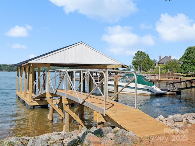 view of dock with a water view