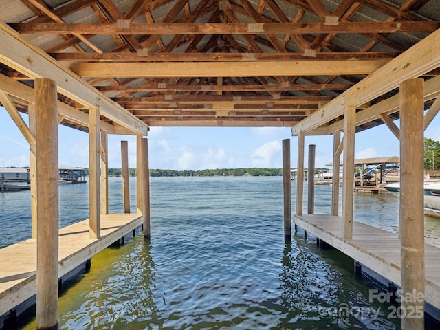 dock area featuring a water view