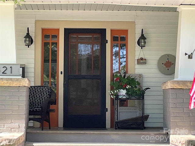 entrance to property with covered porch