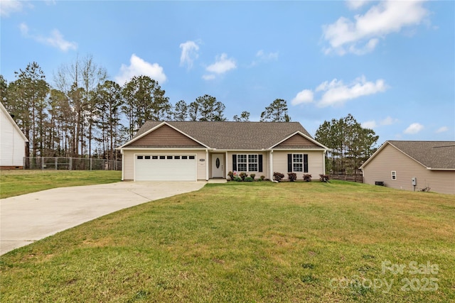 single story home with driveway, an attached garage, fence, and a front lawn