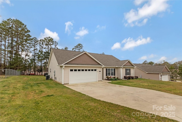 single story home with fence, a garage, a front lawn, driveway, and a shingled roof