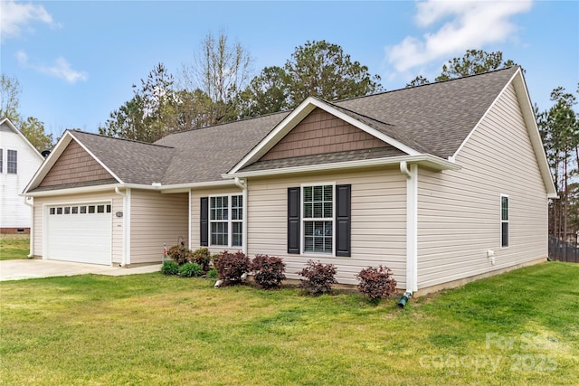 view of front of property with a garage, roof with shingles, concrete driveway, and a front yard