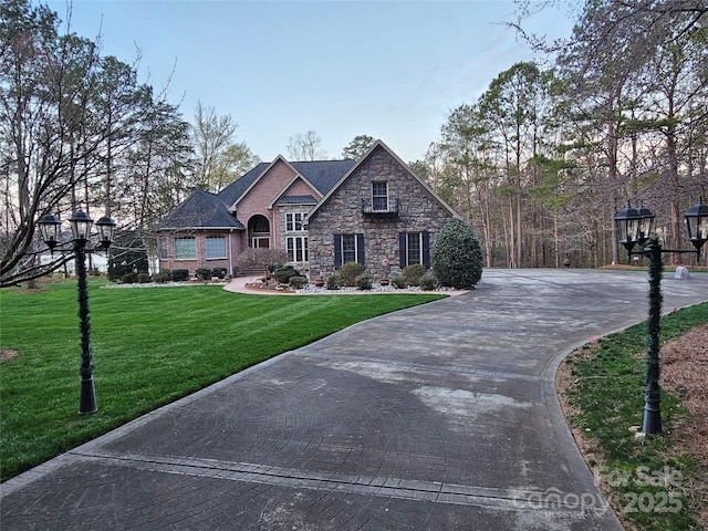 1832 Marthas Vineyard Rd, York, SC 29745 - view of front facade featuring driveway, a front lawn, and stone siding