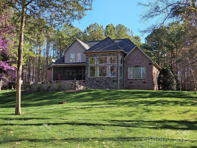 1832 Marthas Vineyard Rd, York, SC 29745 - rear view of house with a yard, brick siding, crawl space, and a sunroom