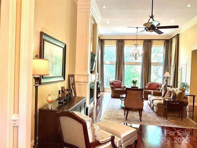 1832 Marthas Vineyard Rd, York, SC 29745 - living area featuring crown molding, wood finished floors, baseboards, ceiling fan, and recessed lighting