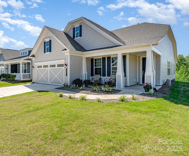 10421 Superb Ln, Charlotte, NC 28215 - craftsman-style house with roof with shingles, an attached garage, concrete driveway, and a front lawn