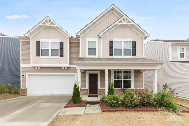 craftsman inspired home featuring driveway, stone siding, an attached garage, board and batten siding, and a porch
