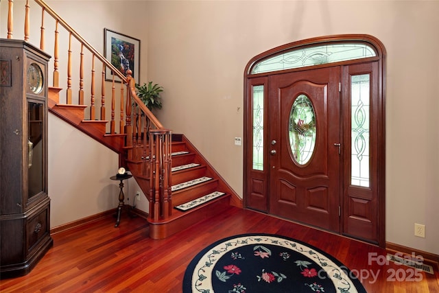 421 N Boundary Rd, Mill Spring, NC 28756 - entrance foyer featuring wood finished floors, stairs, and healthy amount of natural light