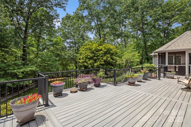 421 N Boundary Rd, Mill Spring, NC 28756 - deck featuring a sunroom