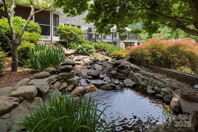 421 N Boundary Rd, Mill Spring, NC 28756 - surrounding community featuring a garden pond