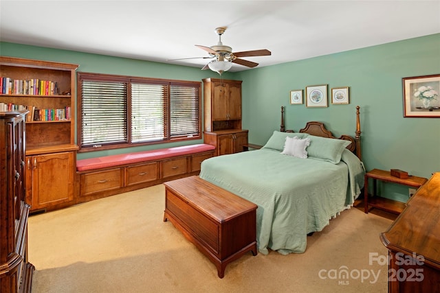 421 N Boundary Rd, Mill Spring, NC 28756 - bedroom featuring light carpet and a ceiling fan