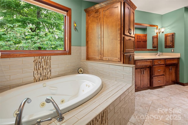 421 N Boundary Rd, Mill Spring, NC 28756 - full bathroom with vanity, a jetted tub, and tile patterned flooring