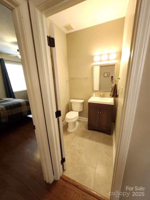 18224 Taffrail Way, Cornelius, NC 28031 - ensuite bathroom with toilet, vanity, ensuite bath, baseboards, and visible vents