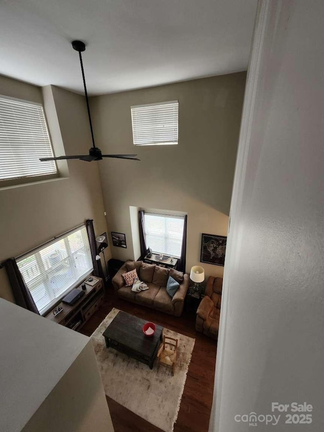 18224 Taffrail Way, Cornelius, NC 28031 - living area with a towering ceiling, wood finished floors, and a ceiling fan