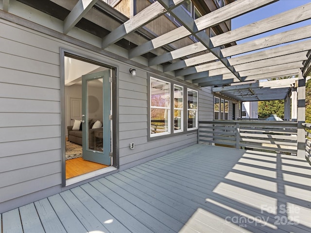 wooden terrace with a pergola
