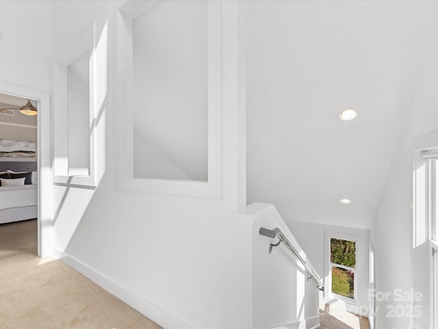 stairs featuring carpet floors, recessed lighting, and baseboards